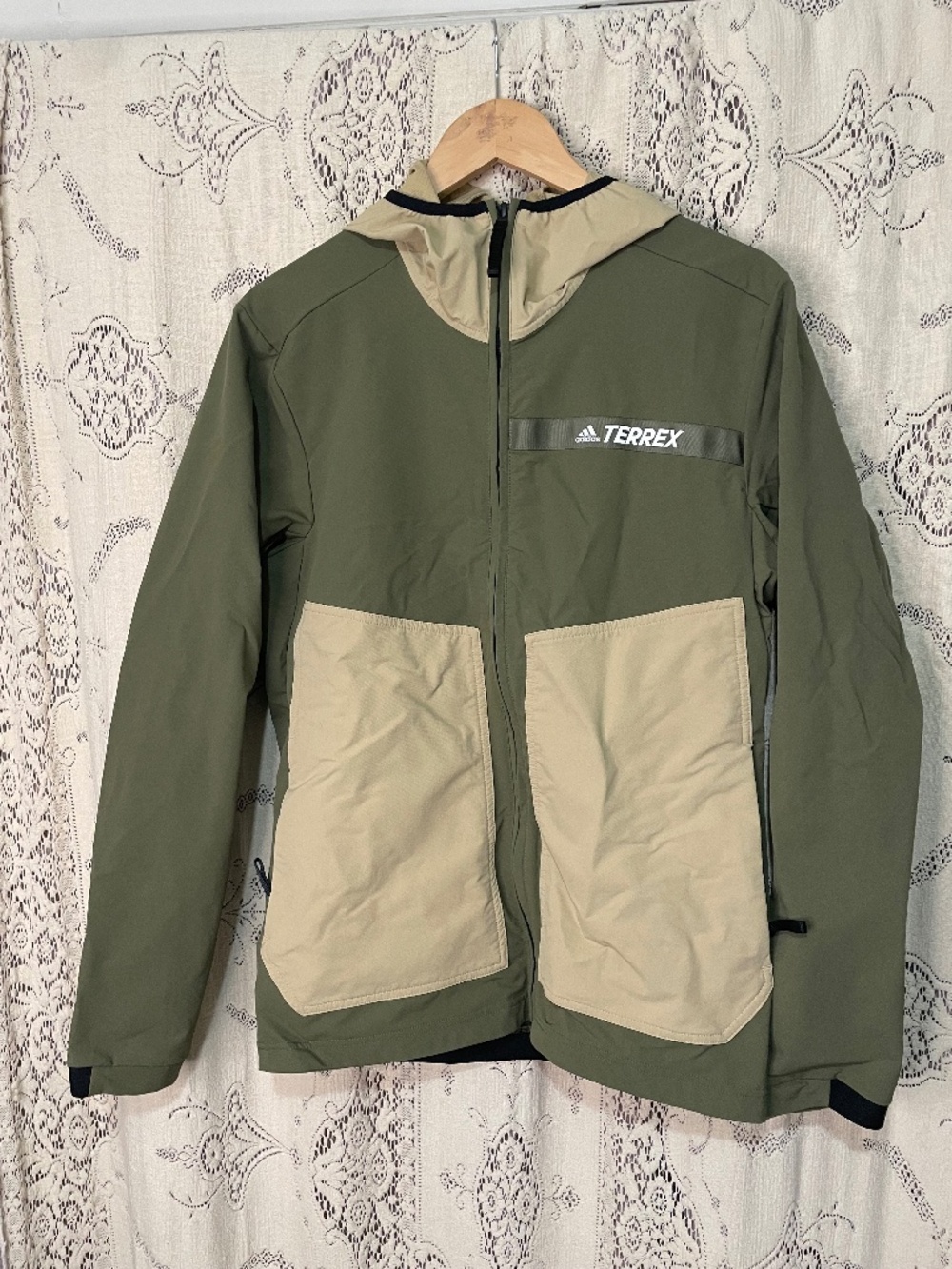 Adidas: Terrex Multi Stretch Softshell Jacket in green. 